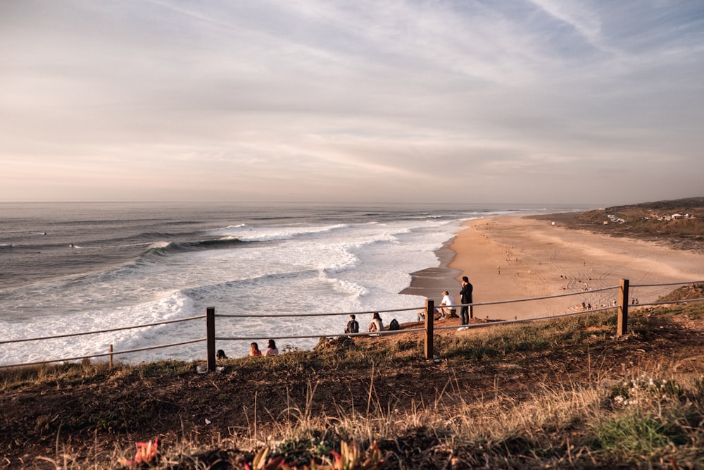 a group of people on a beach