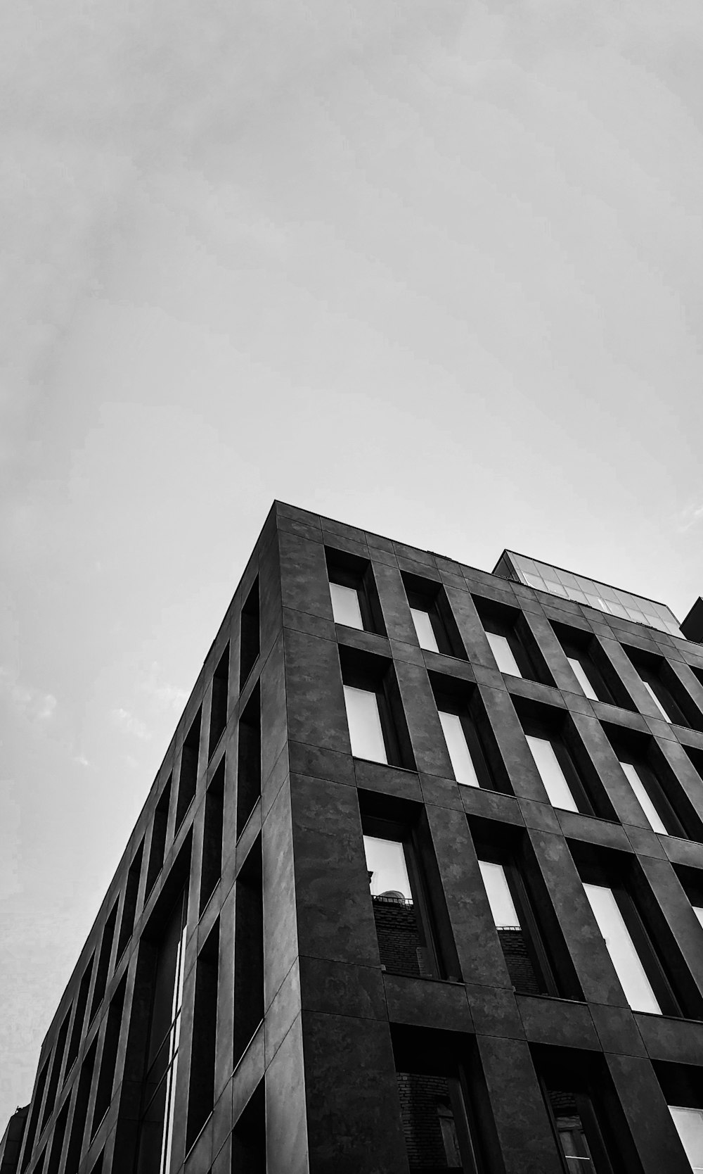 a tall building with a curved roof