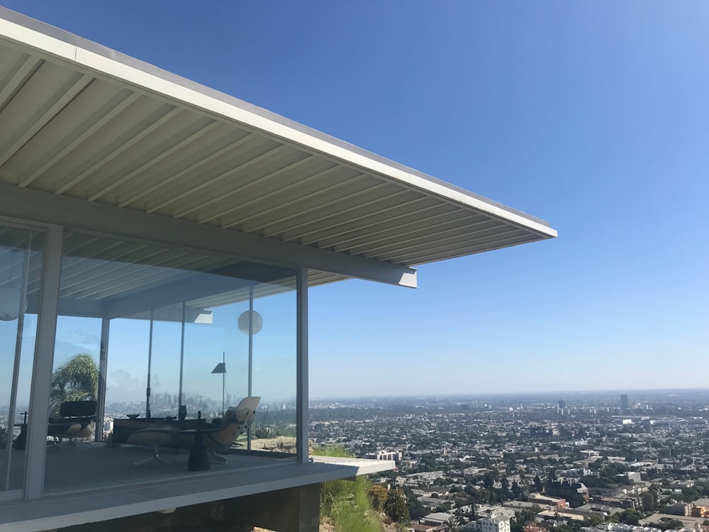 a building with a city in the background