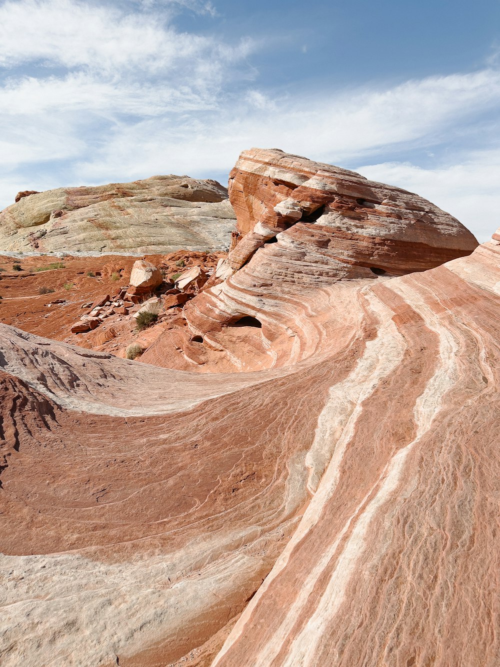 a rocky mountain with a dirt road