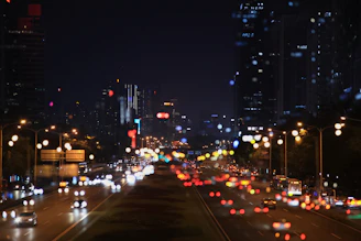 A bustling city street scene at night, captured for an urban culture documentary