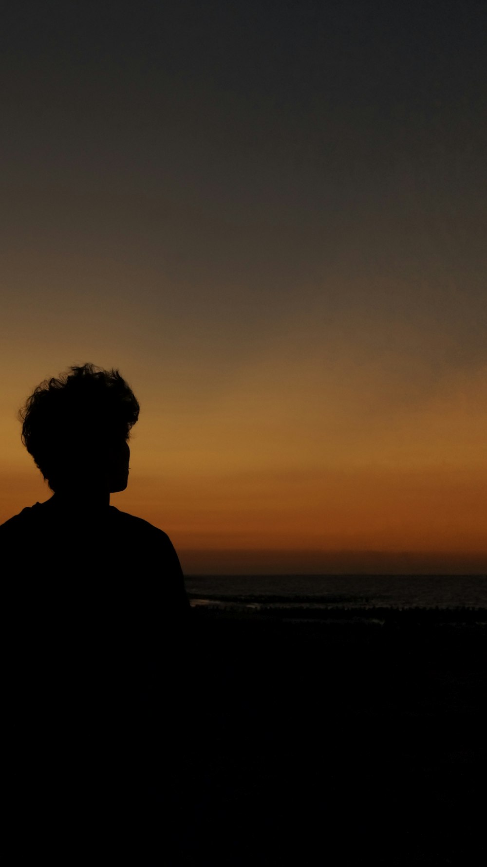 a person standing on a beach