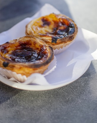 a couple of pastries on a plate