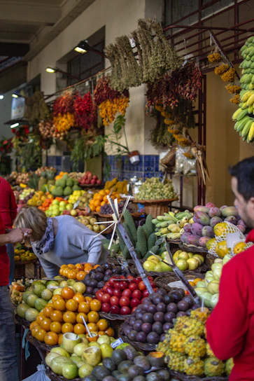 A vibrant market scene in Brazil showcasing colorful fruits and spices ready for export.