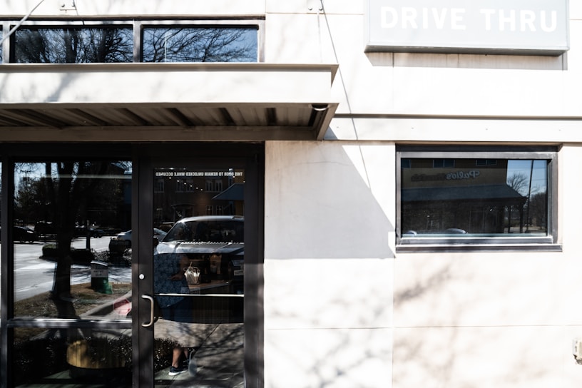 Front exterior of j&a smog and service with clear signage and welcoming entrance on a sunny day