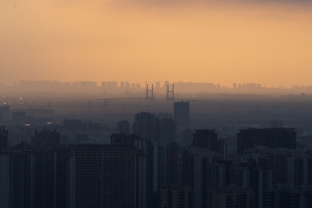 a city skyline at sunset