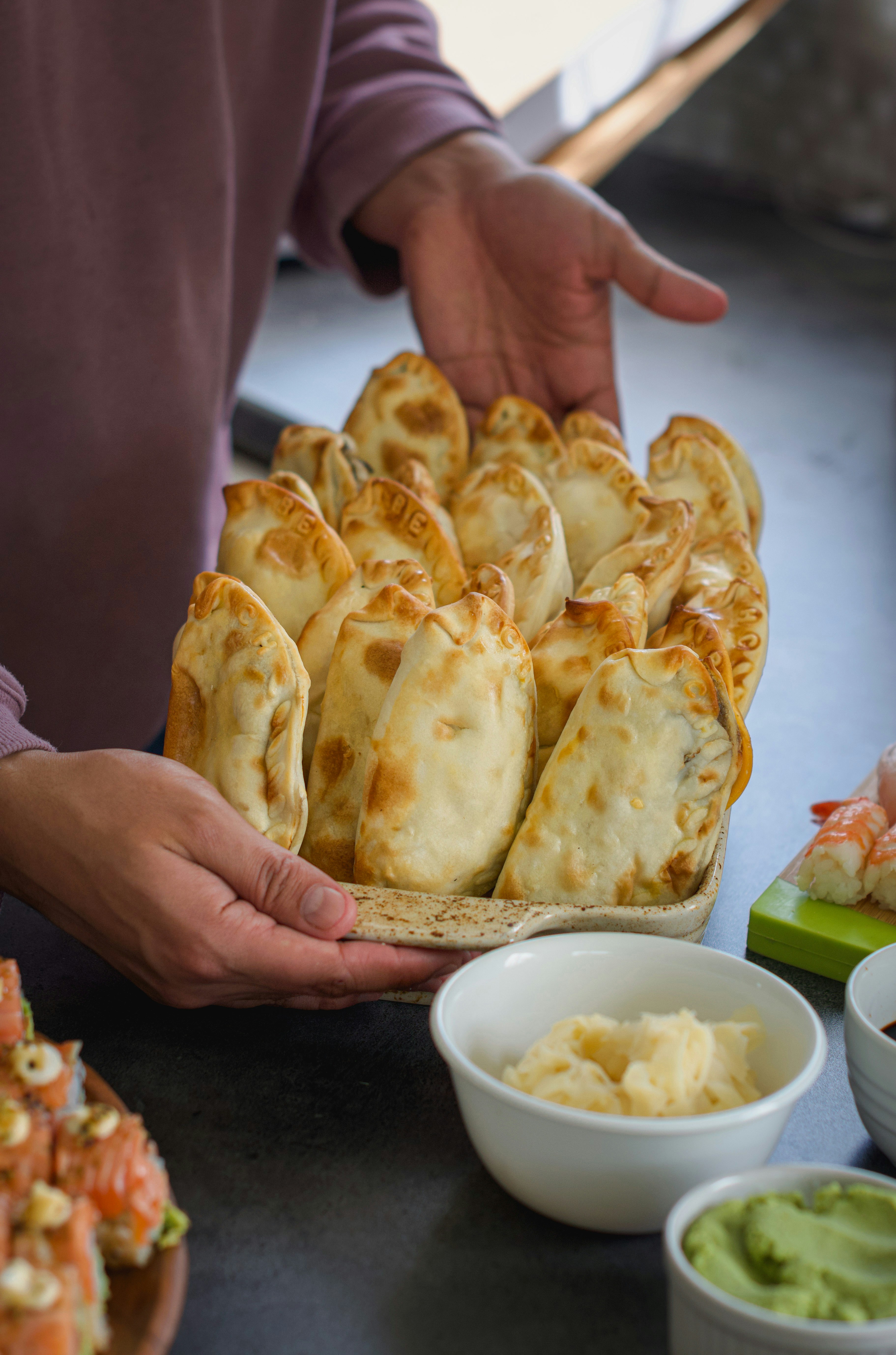 A person holding a large plate of food photo Free Food Image on Unsplash