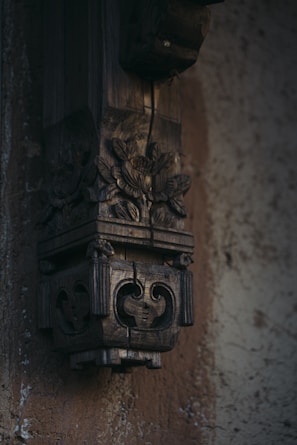 A beautifully crafted wooden wall art piece with intricate designs.