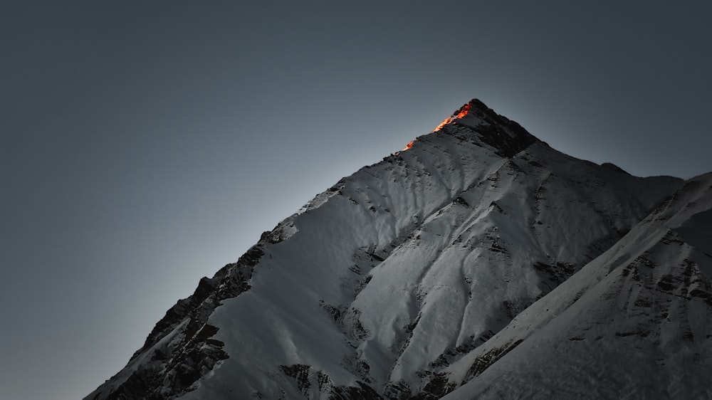 a mountain with snow