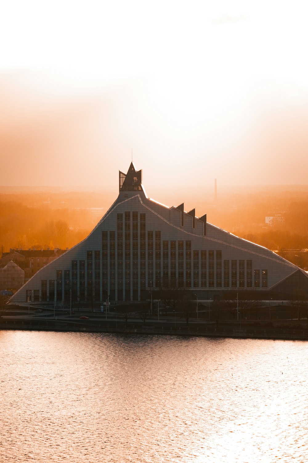 a building with a bridge over water