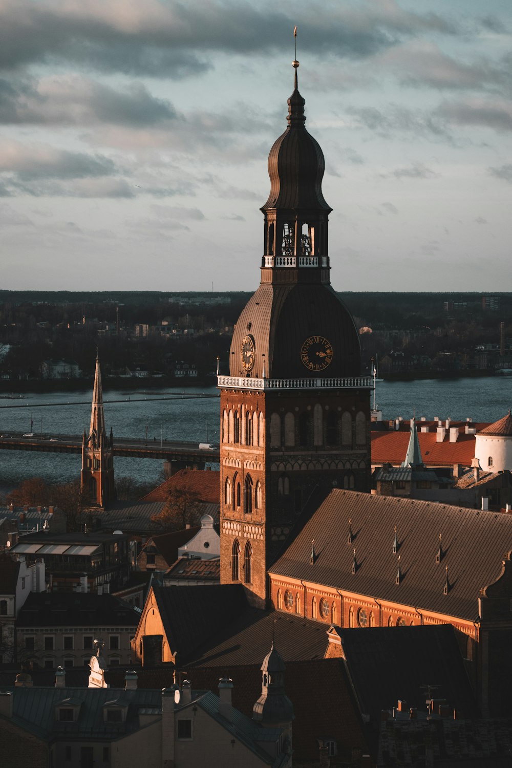 a large building towers over a city