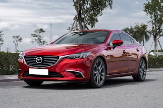 a red car parked on a street