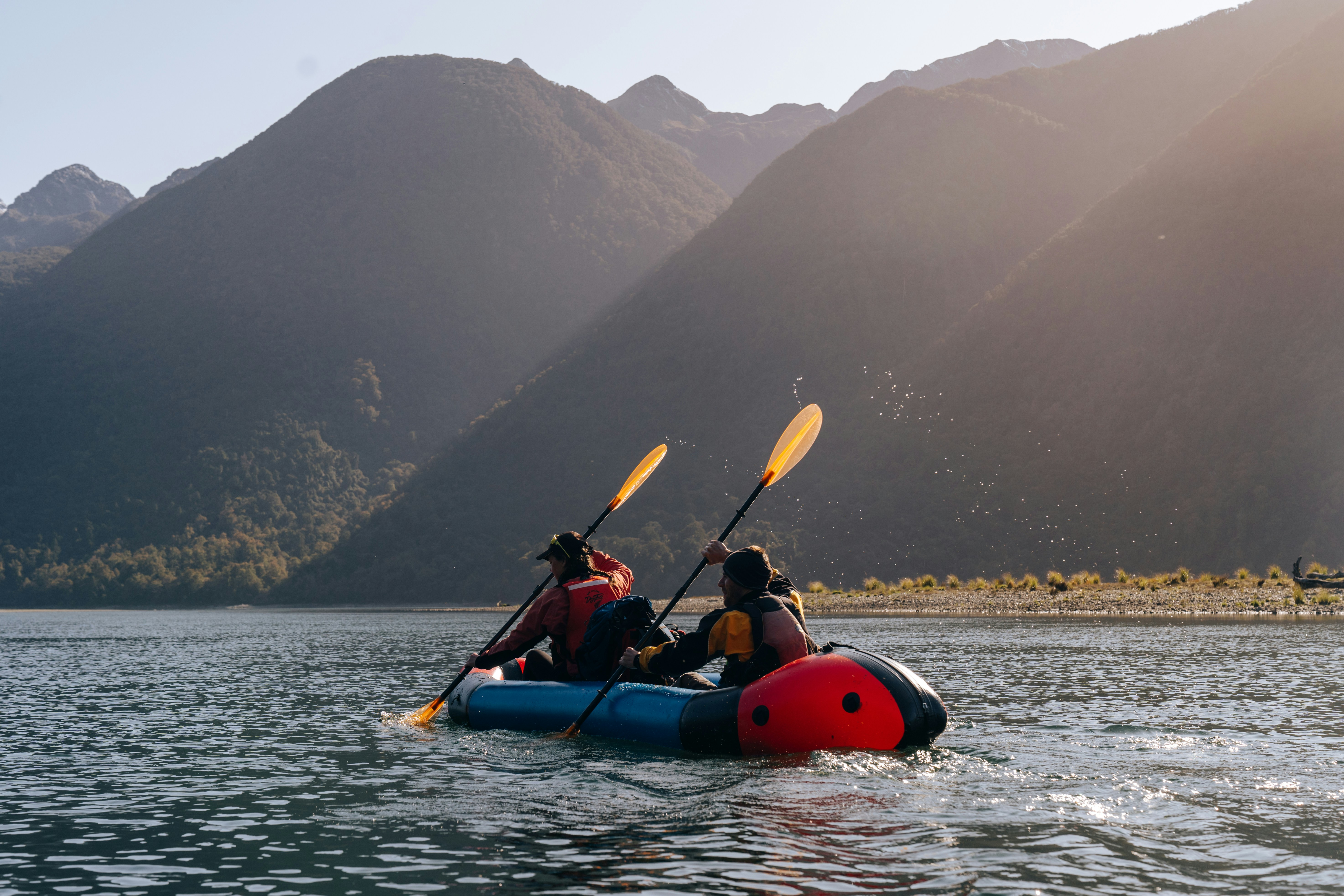 a group of people in a canoe
