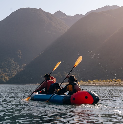 a group of people in a canoe