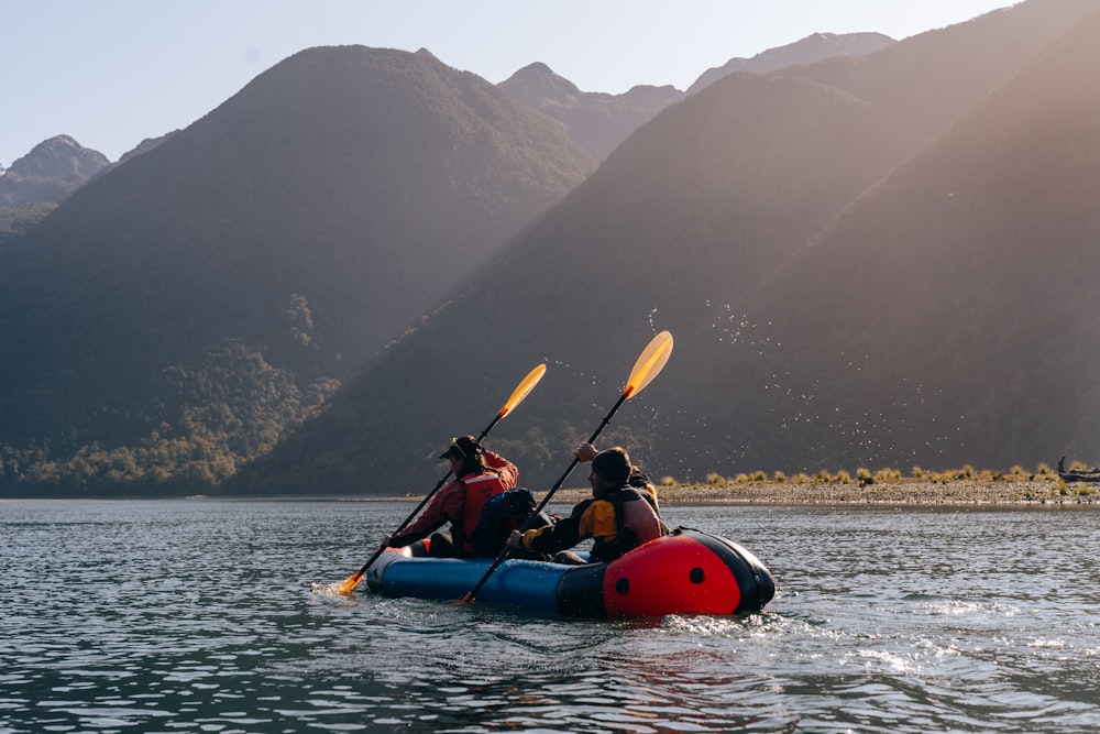 a group of people in a canoe