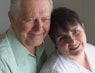 a man and woman smiling