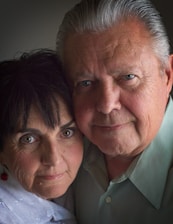 a man and woman taking a selfie