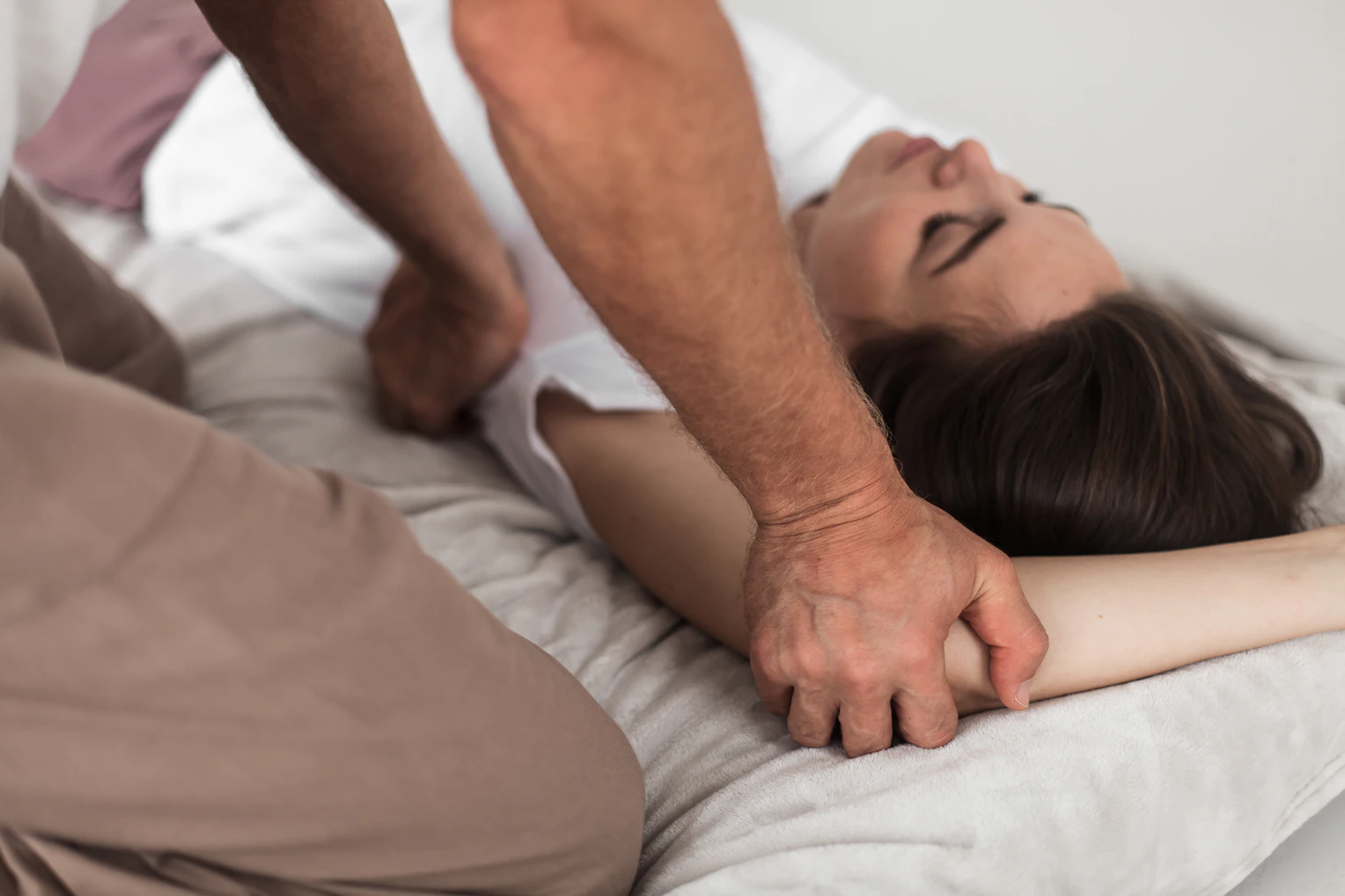 a person sleeping on a bed