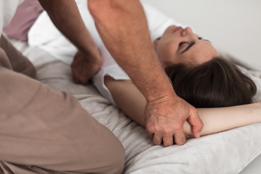 a person sleeping on a bed