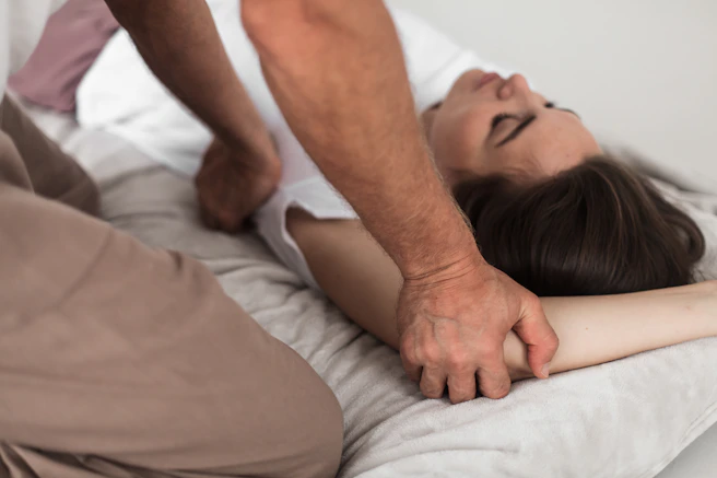 a person sleeping on a bed
