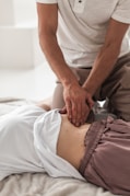 a person holding a person's leg