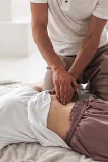a person holding a person's leg