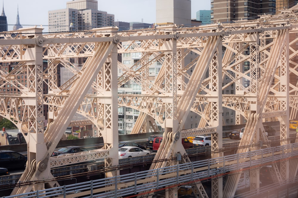 a train traveling over a bridge over a river