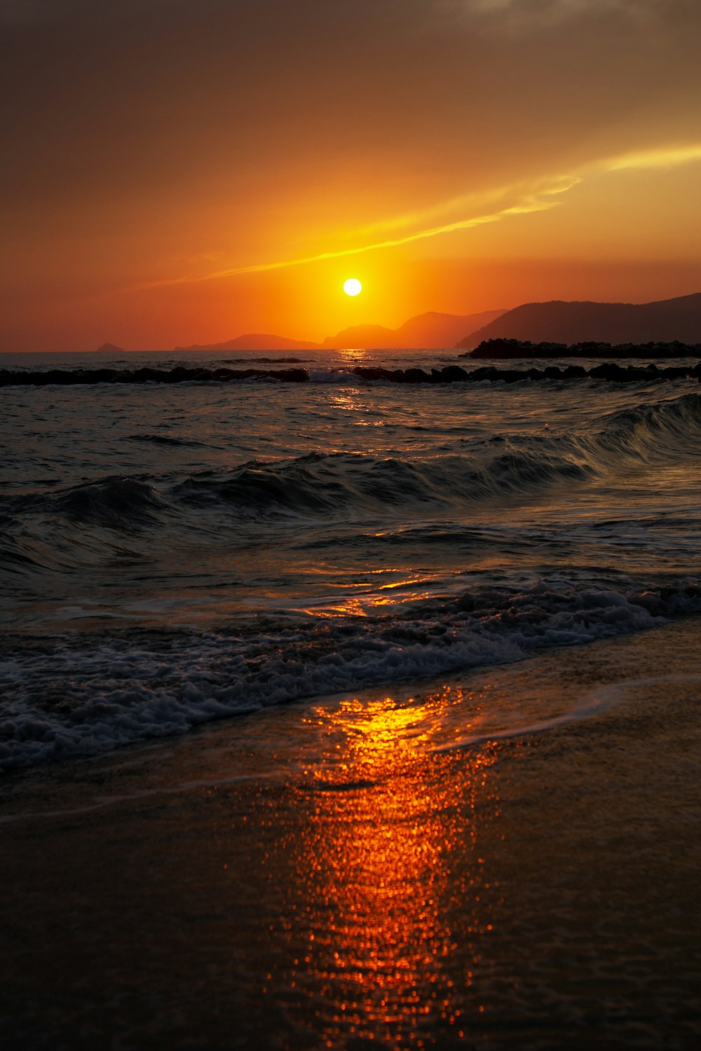 a sunset over a beach