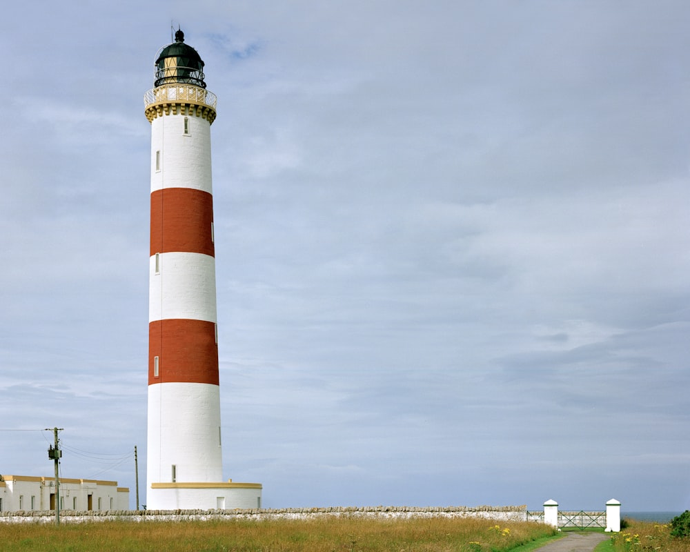a lighthouse with a blue sky
