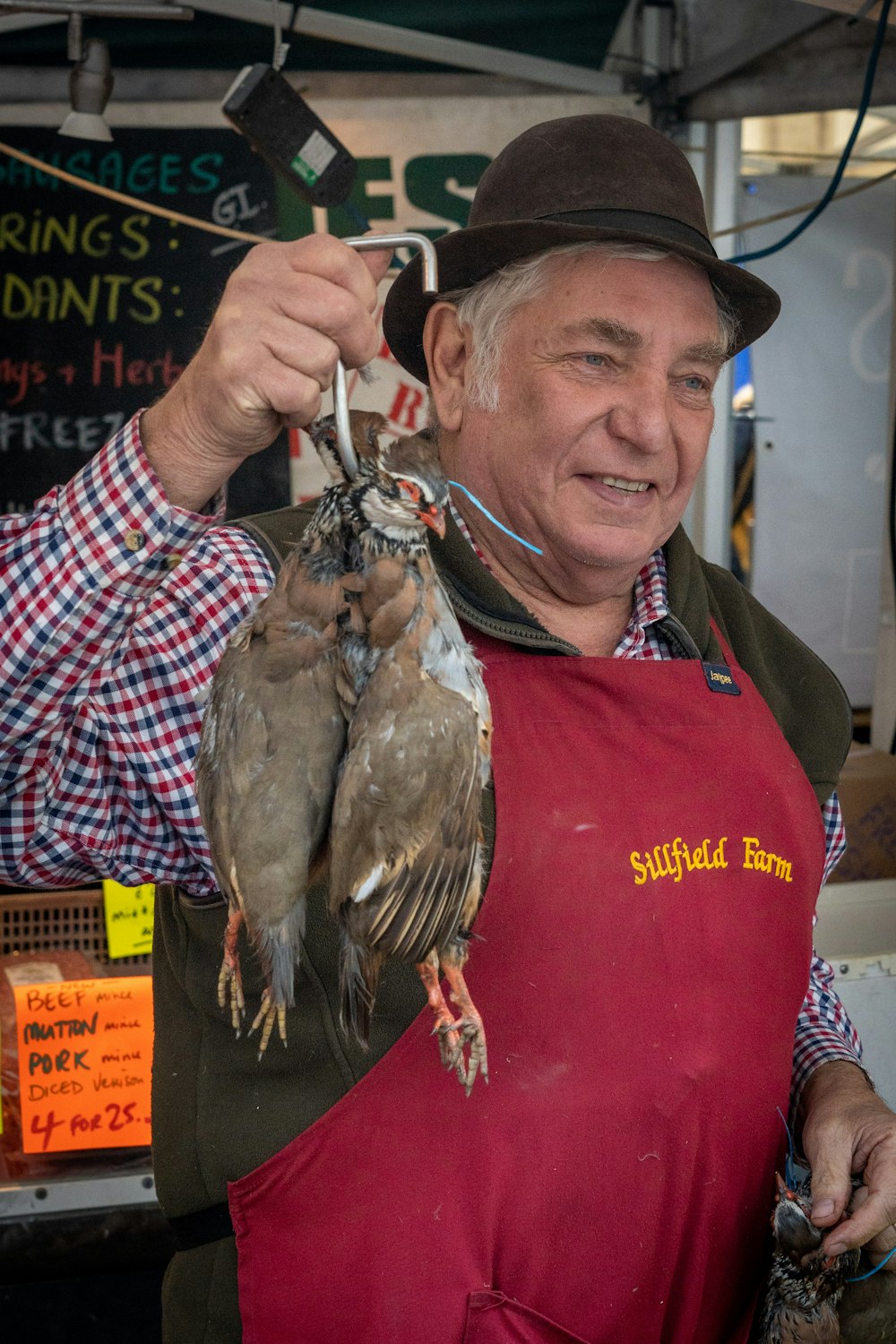 a man holding a bird