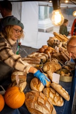 a person selling food at a market