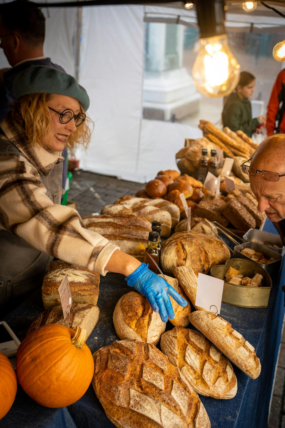 a person selling food at a market