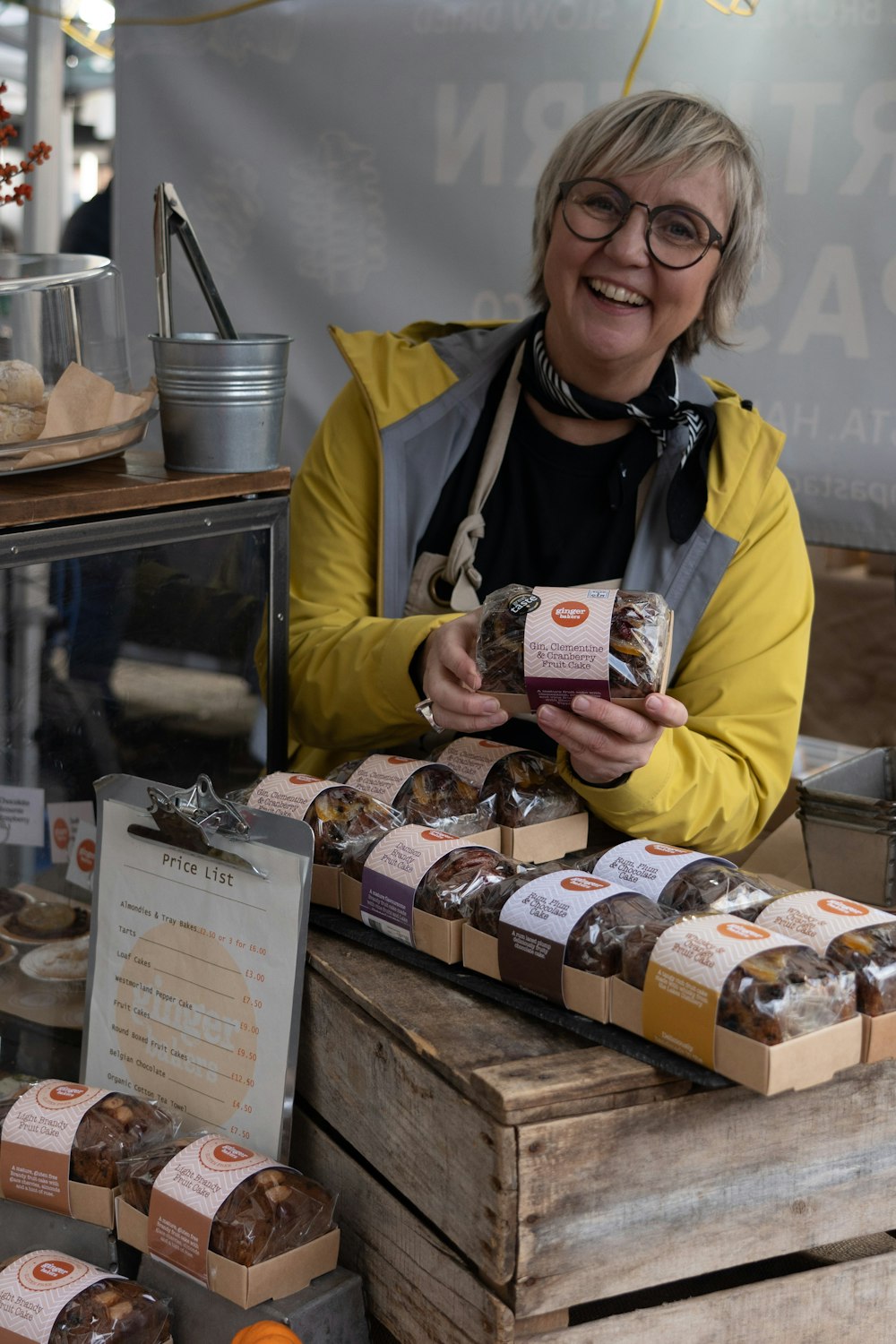 a person holding a box of cookies