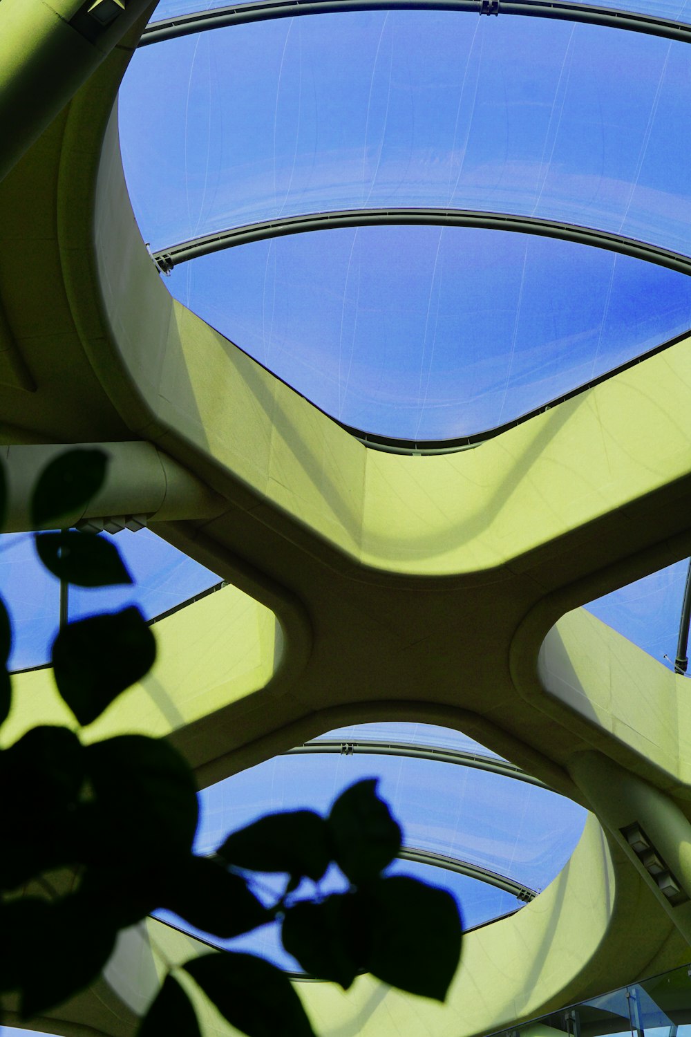 a circular window with a blue sky