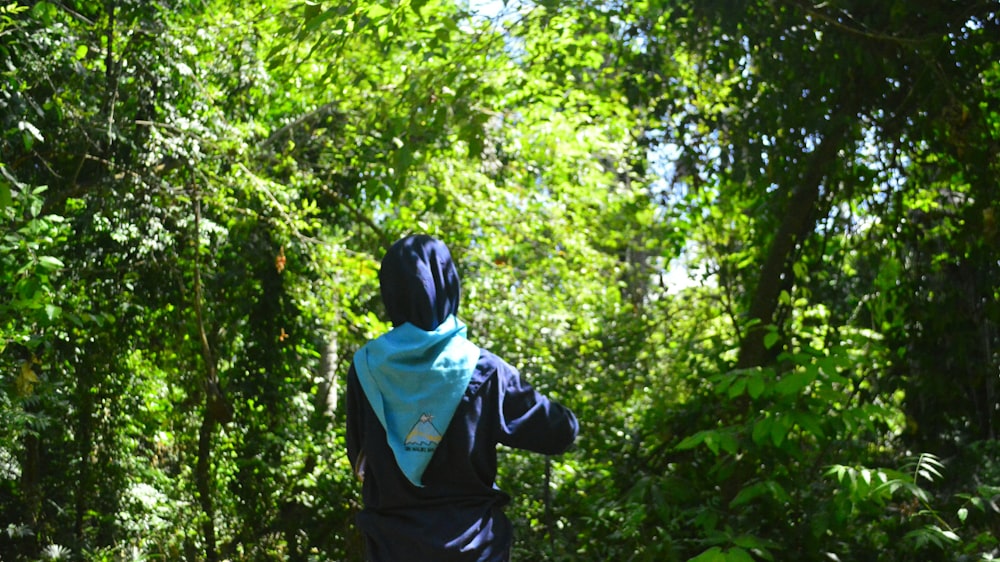 a person walking through a forest