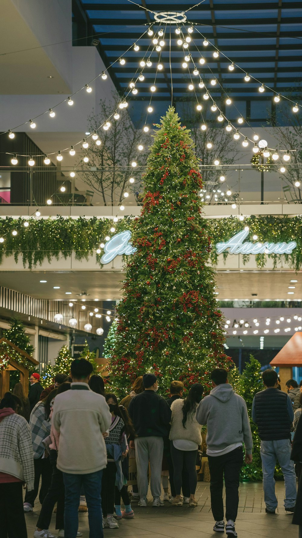 a large christmas tree in a building