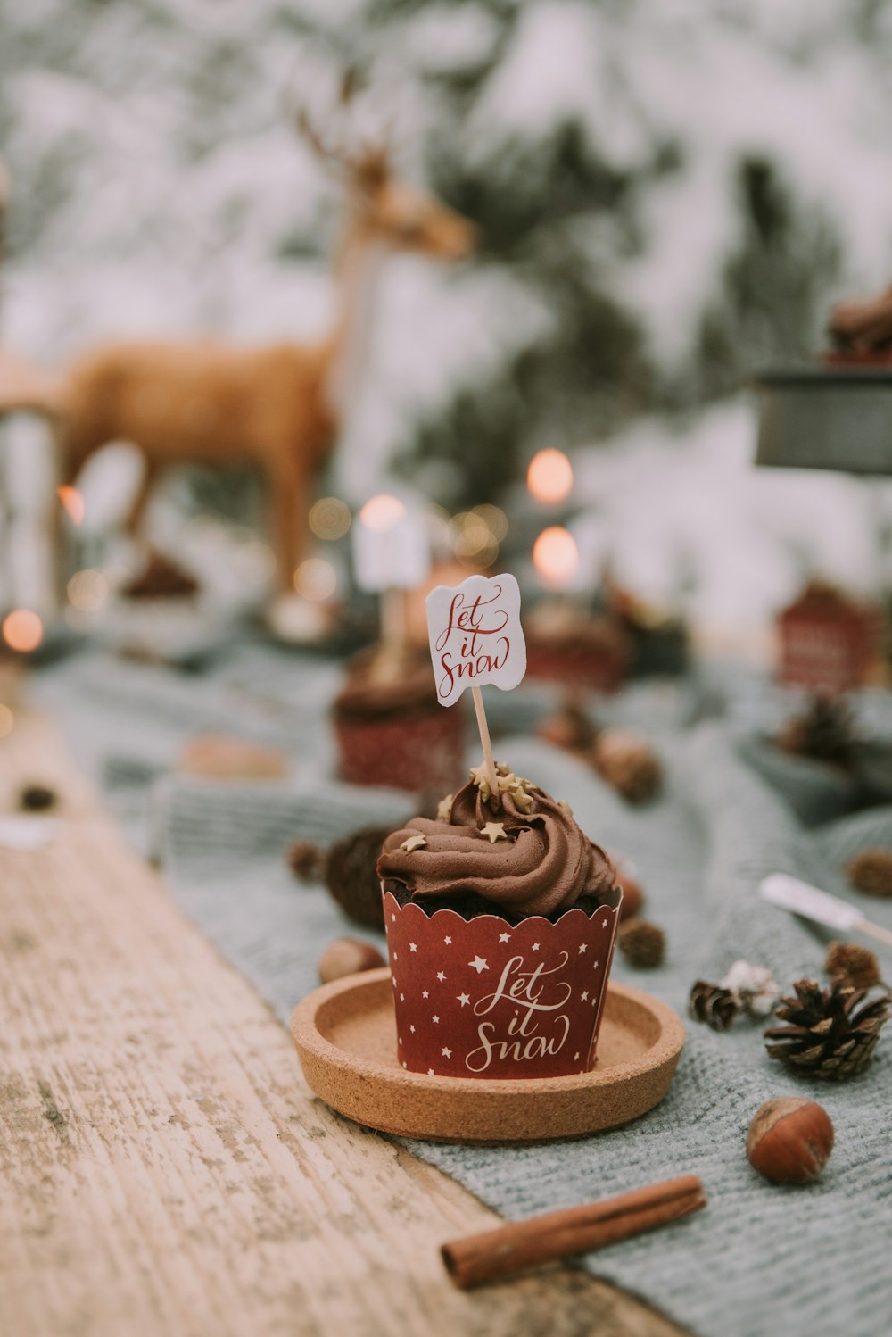 a chocolate cupcake with a candle