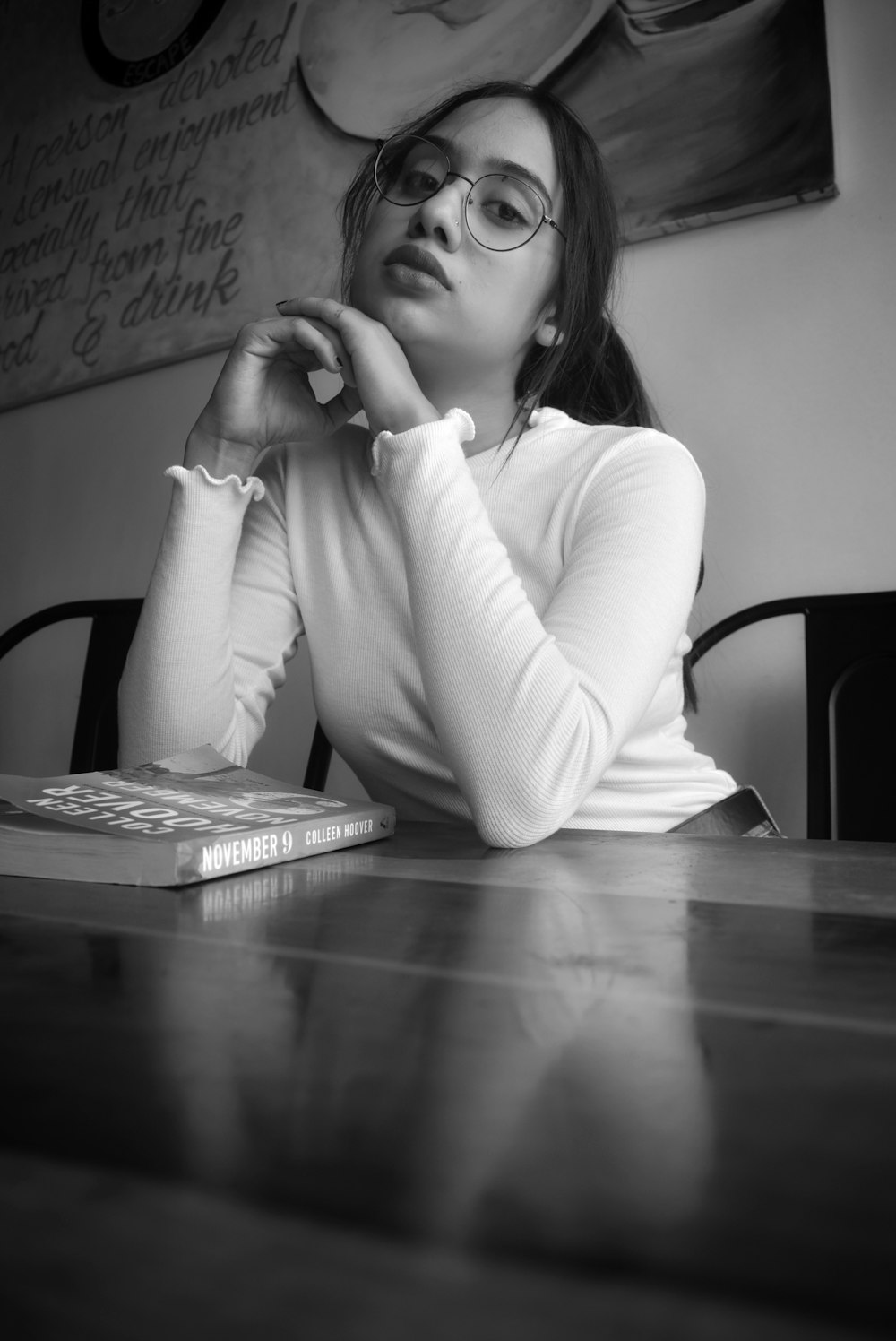 a woman sitting at a desk