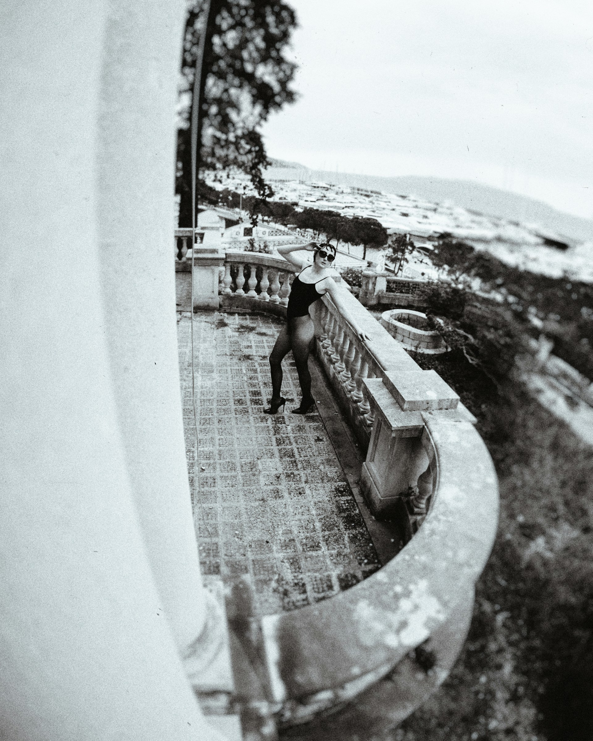 woman wearing yellow long-sleeved dress under white clouds and blue sky during daytime