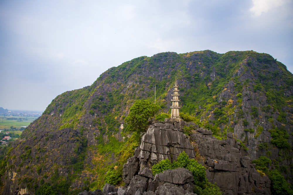a stone tower on a hill