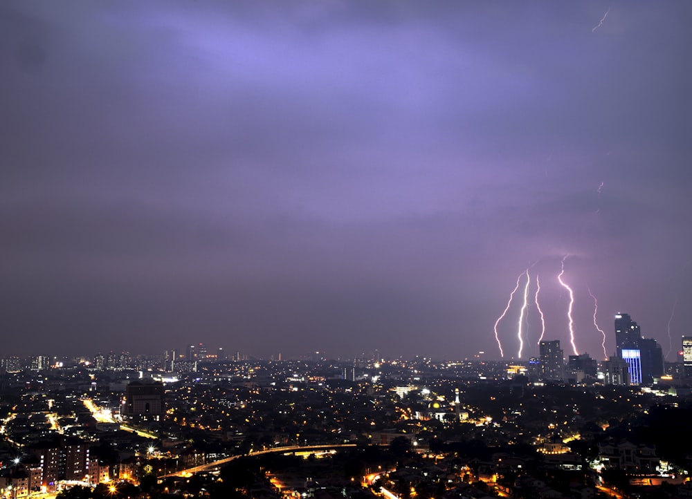 a city with fireworks in the sky