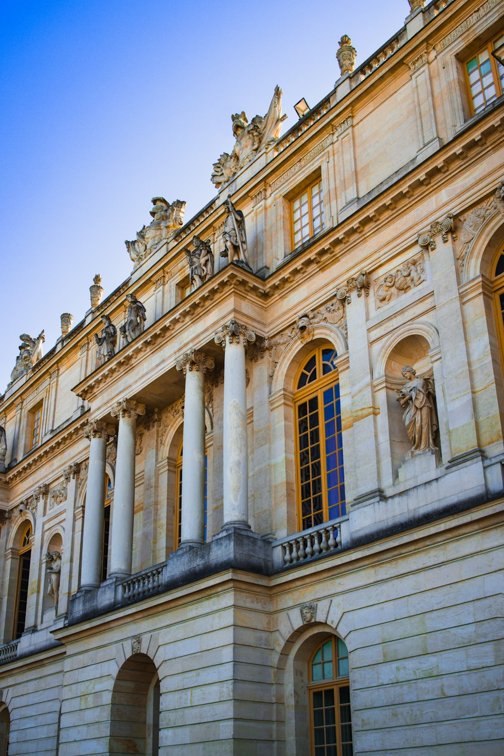 a building with statues on the side