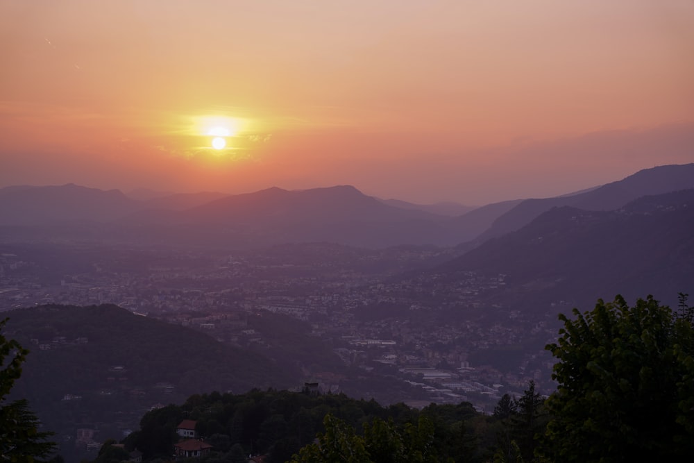 a sunset over a city