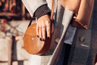 a person holding a purse