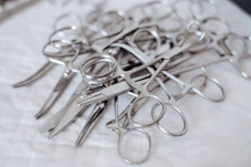 a group of silver scissors