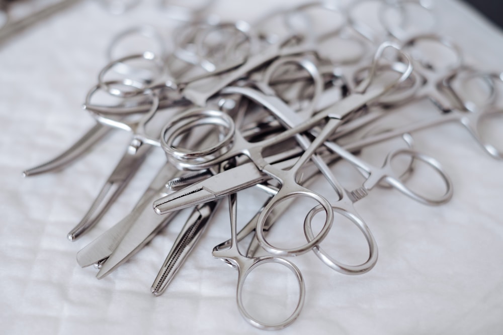 a group of silver scissors