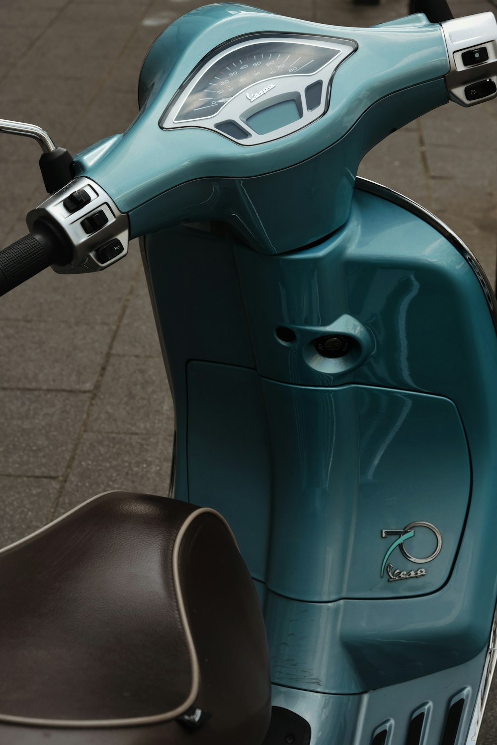 a blue and green scooter