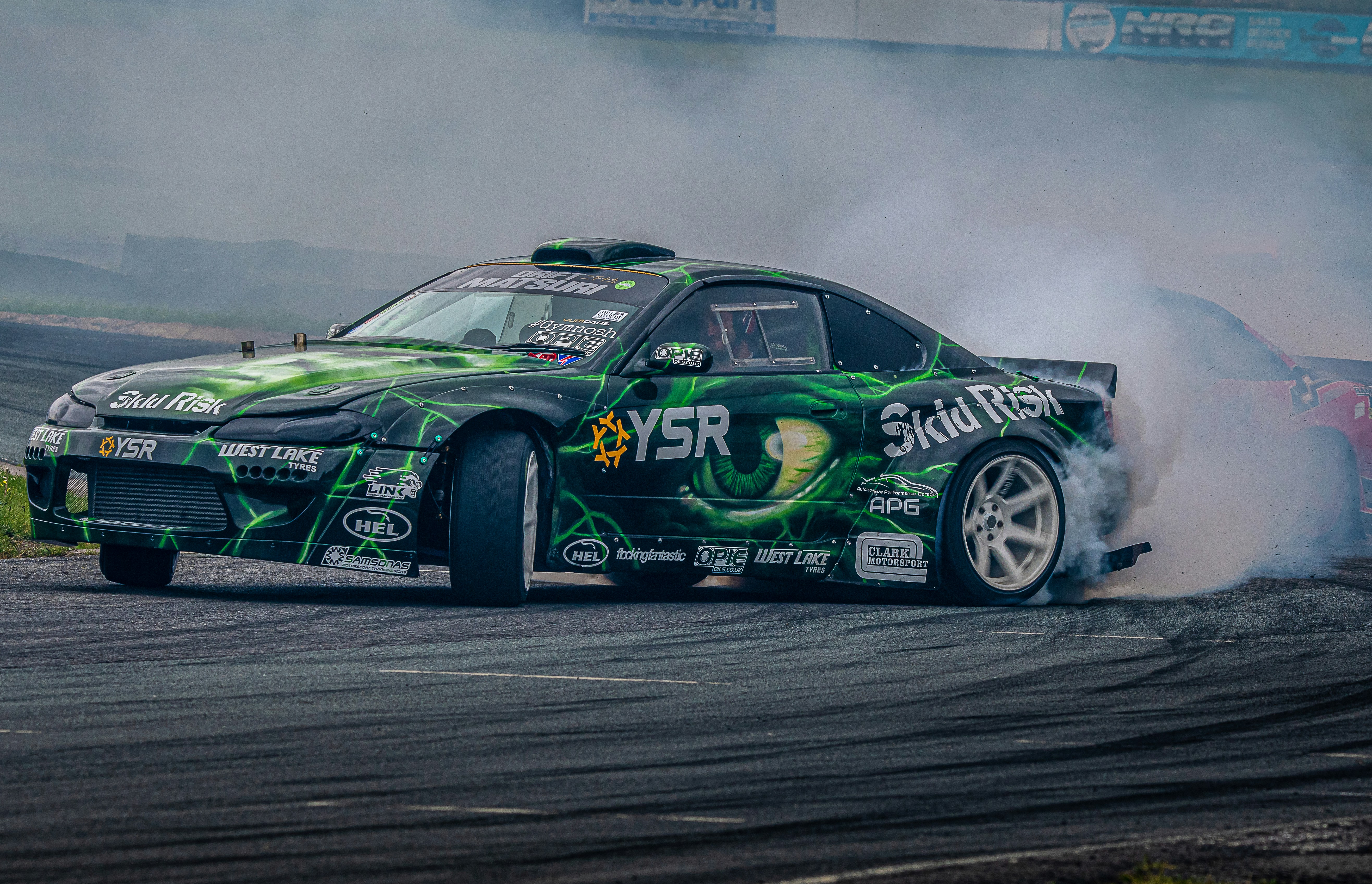 JDM drift car smoke, ilustrasi artikel High-Octane Aesthetics: Where to Find the Best HD JDM Drift Car Wallpapers 1