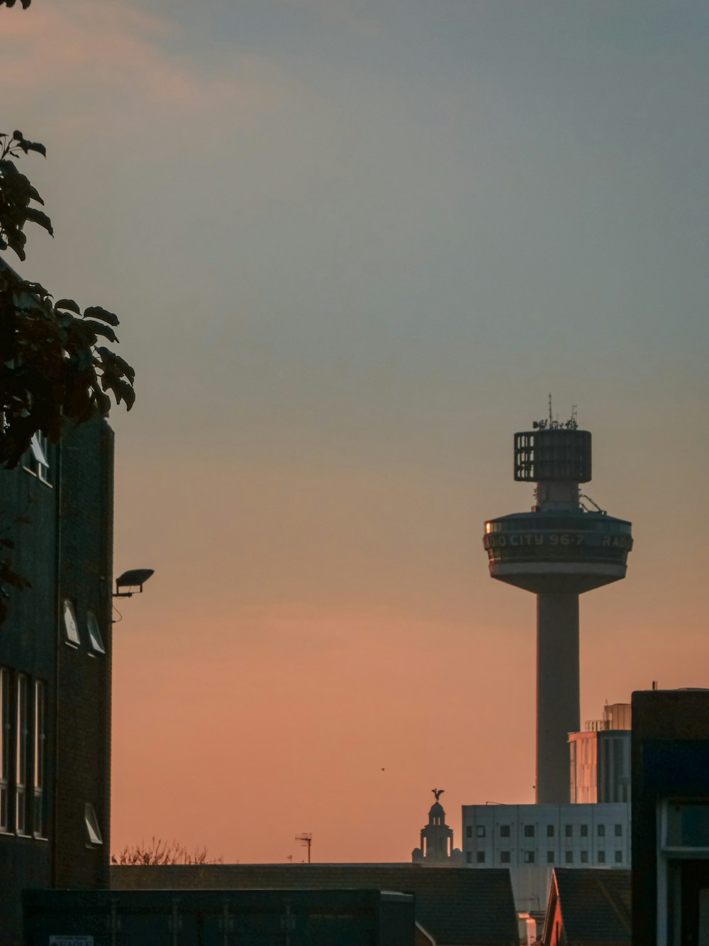 a tall tower with a light on top