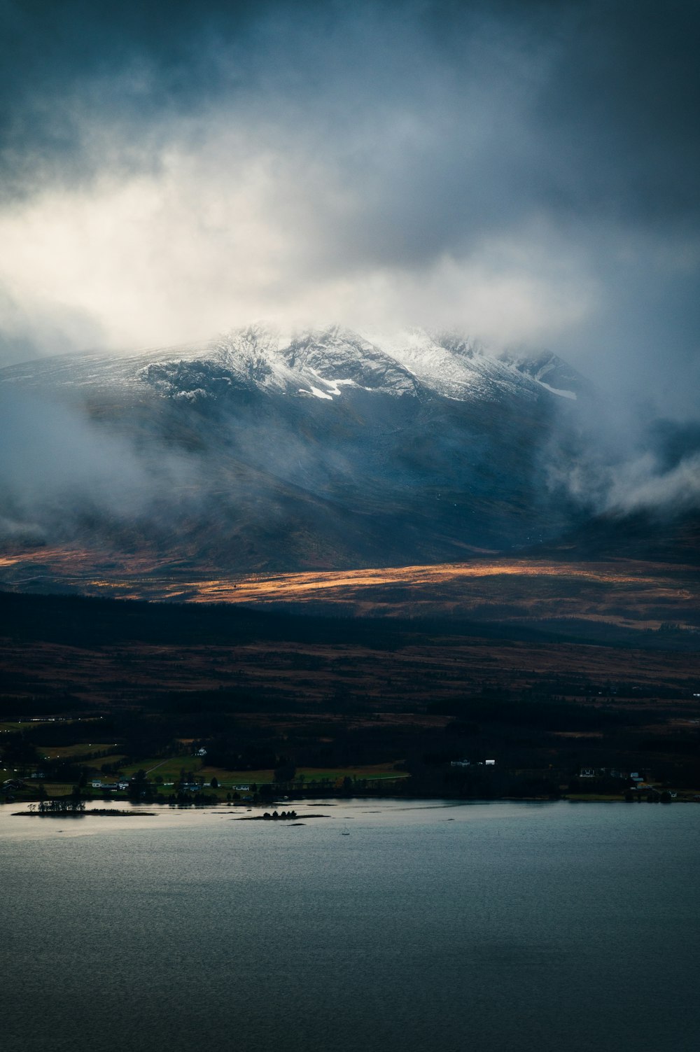 a mountain with a snow covered peak